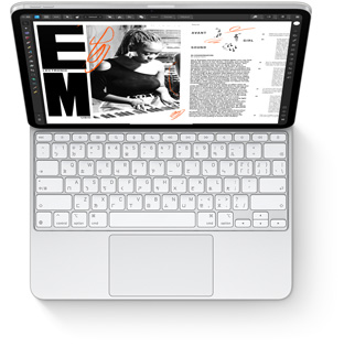 iPad Pro 搭配適用於 iPad Pro 的白色巧控鍵盤的俯視圖。